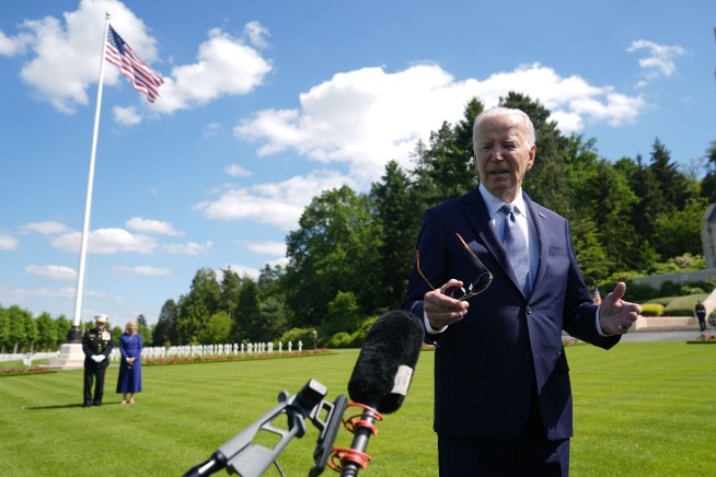 Biden honors US war dead with a cemetery visit ending a French trip that served as a rebuke to Trump