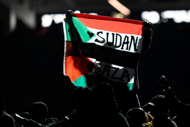 Super Bowl halftime performer who ran with a protest flag is found guilty of resisting an officer