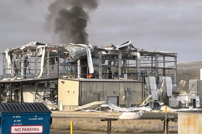 A building is destroyed in an explosion at Northrop Grumman's rocket test site