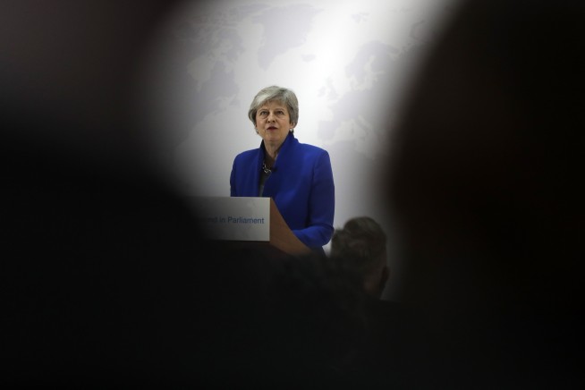 Seeking Brexit support, May offers vote on new referendum