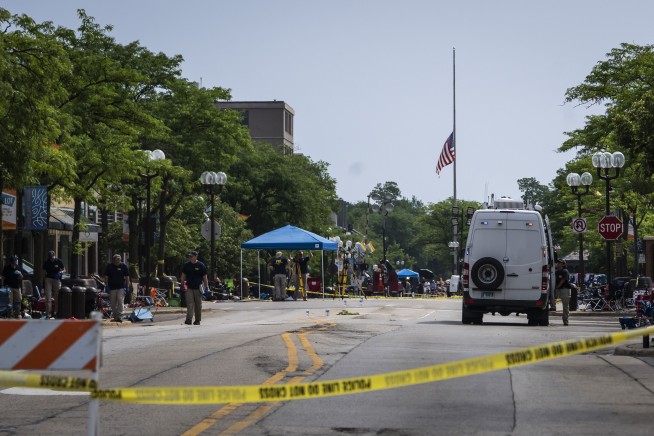 Parade shooting suspect bought 5 weapons despite threats