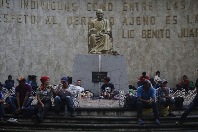 Growing caravan of migrants grows ahead of push into Mexico