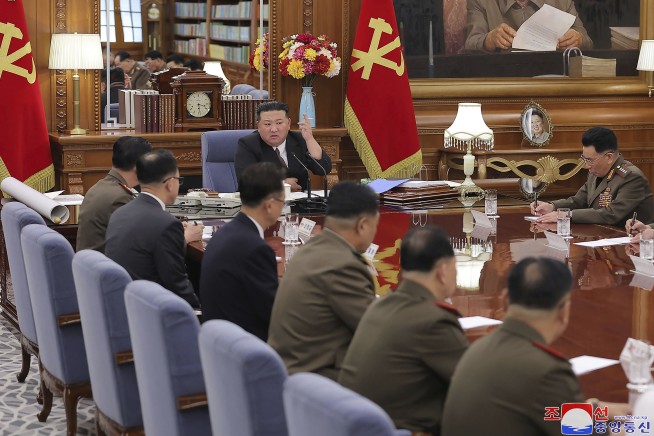 North Korean leader Kim calls for his military to sharpen war plans as his rivals prepare drills