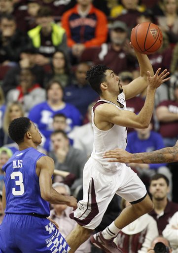 Top-ranked Kentucky beats A&M 70-64 in double OT
