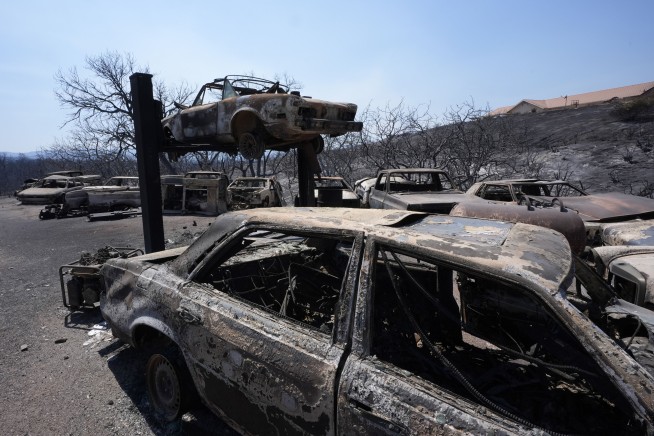 A scenic California mountain town walloped by a blizzard is now threatened by wildfire