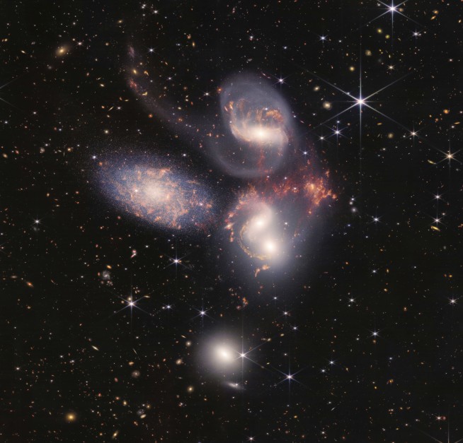 NASA's new telescope shows star death, dancing galaxies