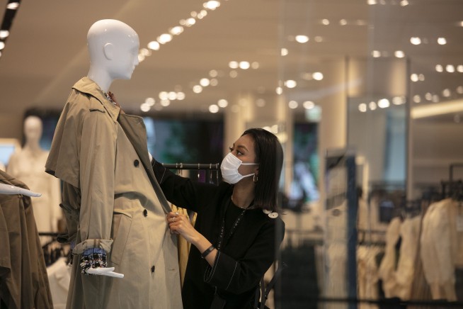 Japan's economy shrinks at record rate, slammed by pandemic