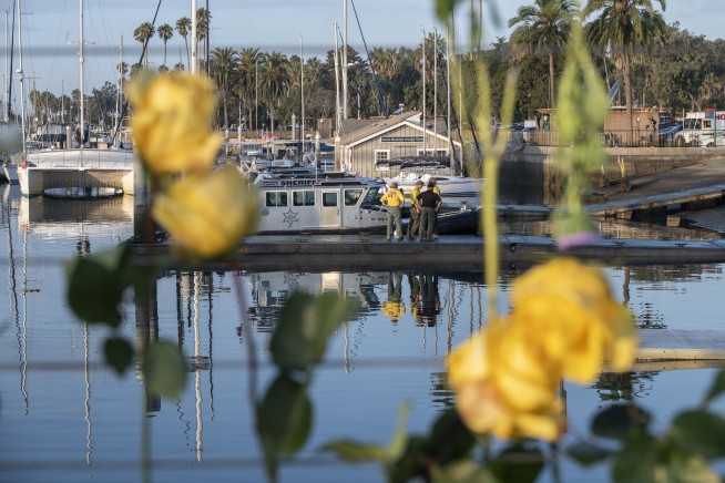 The Latest: Relative: 5 members of same family on boat