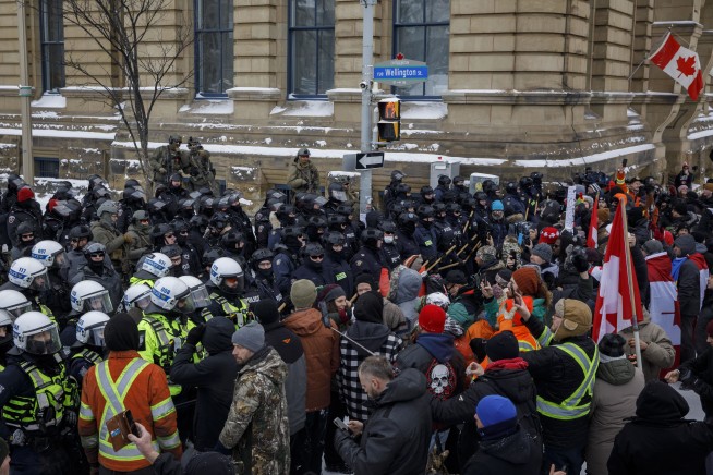 Canadian police clear Parliament street to end siege