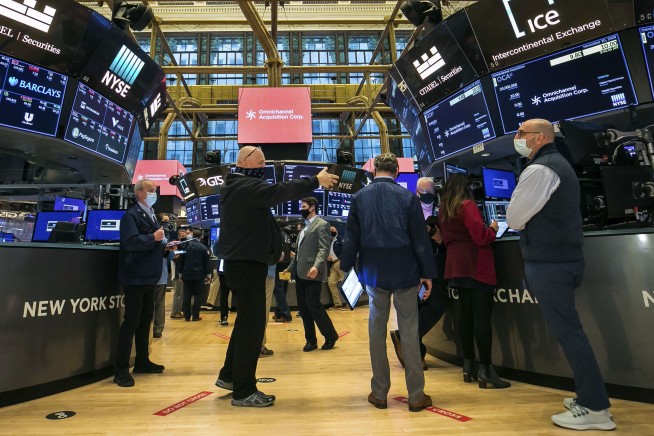 Wall Street slips amid worries about worsening pandemic