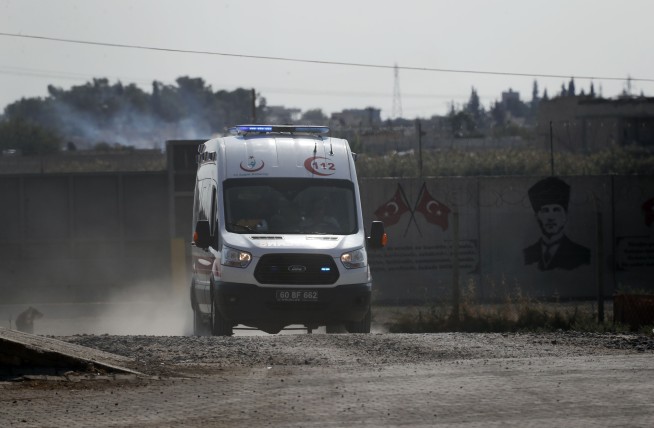 Residents of northeast Syria city pelt departing US troops