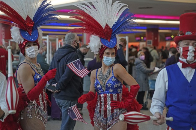As ban lifts, visitors to US await long-delayed hugs, kisses
