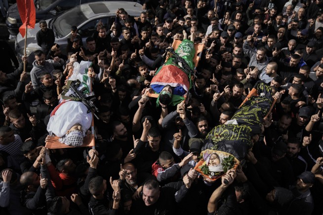 Hamas releases a third group of hostages as part of truce, and says it will seek to extend the deal