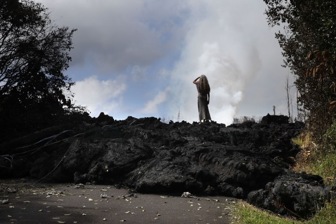 The Latest: New fissure spatters lava on Big Island