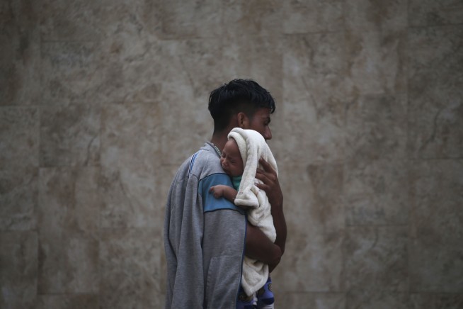 Growing caravan of migrants grows ahead of push into Mexico