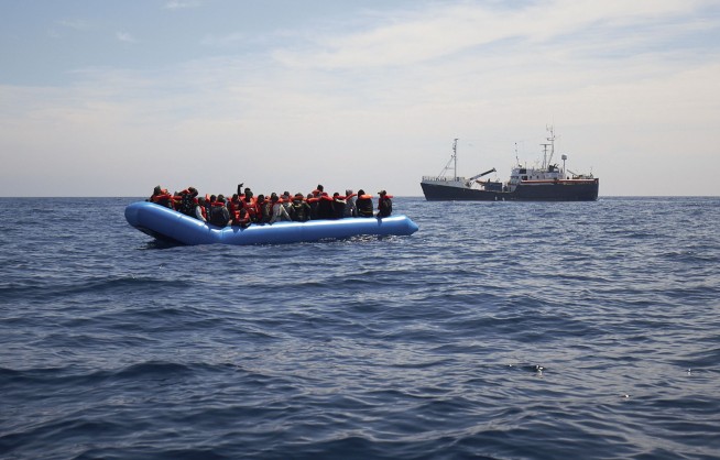 Aid ship with 64 migrants stuck in Mediterranean Sea