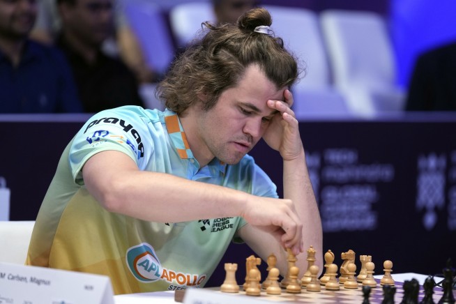Chess grandmaster Magnus Carlsen is forced into a draw in a showdown against ‘the world’