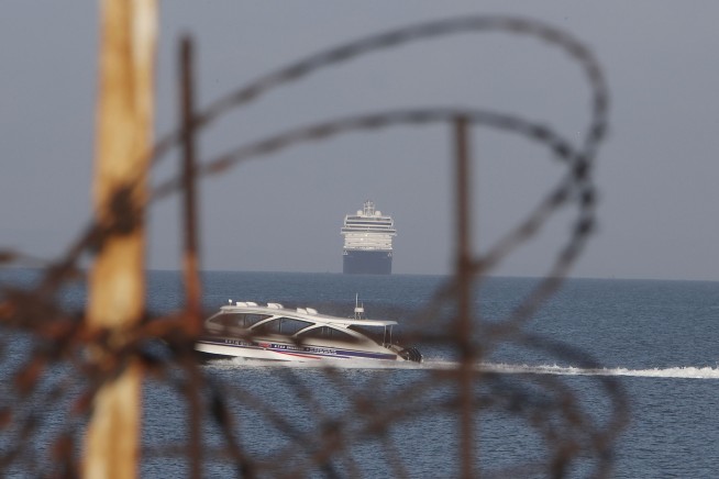 Cruise ship turned away in other ports anchors off Cambodia