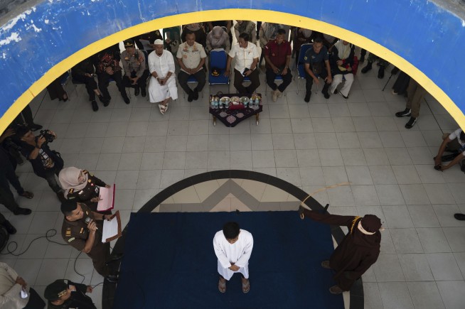 2 men were publicly caned for having sex with each other in Indonesia’s conservative Aceh