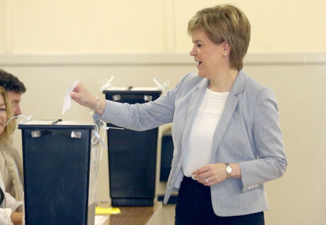 The Latest: Britain's Cameron to resign; won't lead EU talks