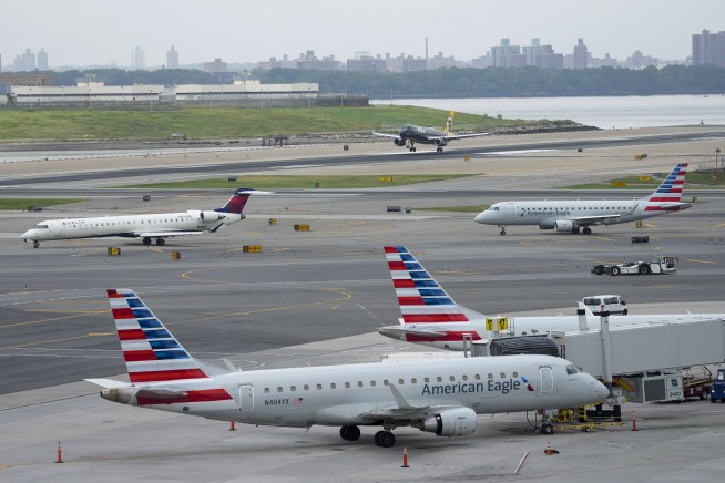 Travelers endure another day of airport agony. One airline has by far the most cancellations