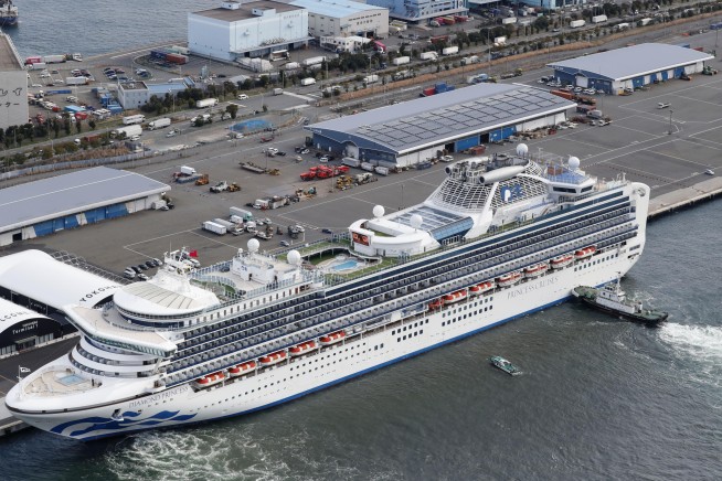 10 more sick with virus on one of two isolated cruise ships