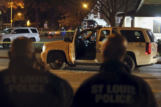 Authorities say Texas, Missouri officers shot in ambushes