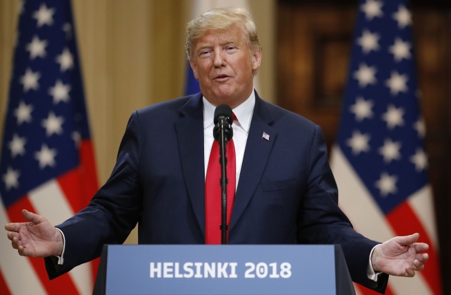 The Latest: Trump says he misspoke on Russia meddling
