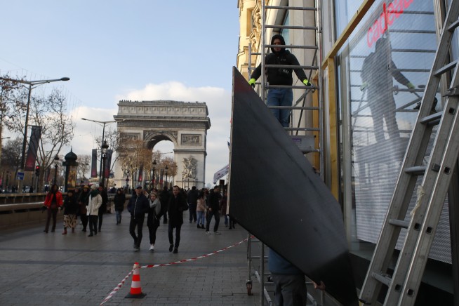 The Latest: Paris police arrest dozens during protests