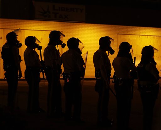 Arrests as Ferguson protesters plan shutdown