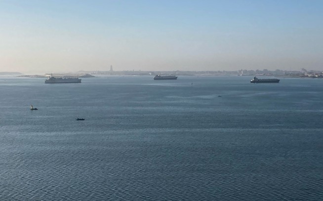 Stuck ship in Egypt's Suez Canal imperils shipping worldwide