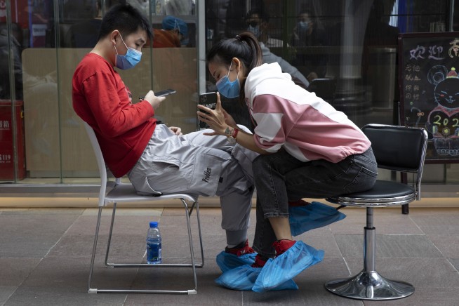 China's virus pandemic epicenter Wuhan ends 76-day lockdown