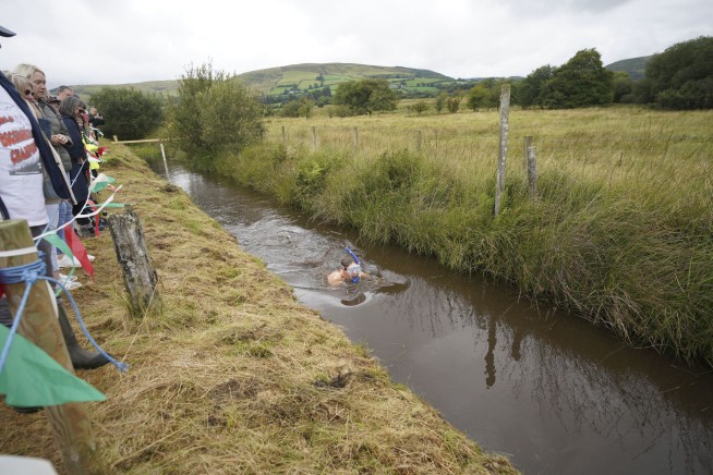 Competitors get down and dirty at Britain's bog snorkeling championships