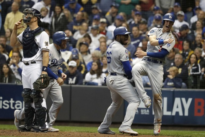 Dodgers beat Brewers in Game 7, face Red Sox in World Series