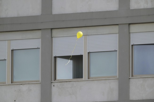 Vatican releases first photograph of the pope in a month as he celebrates Mass in hospital chapel