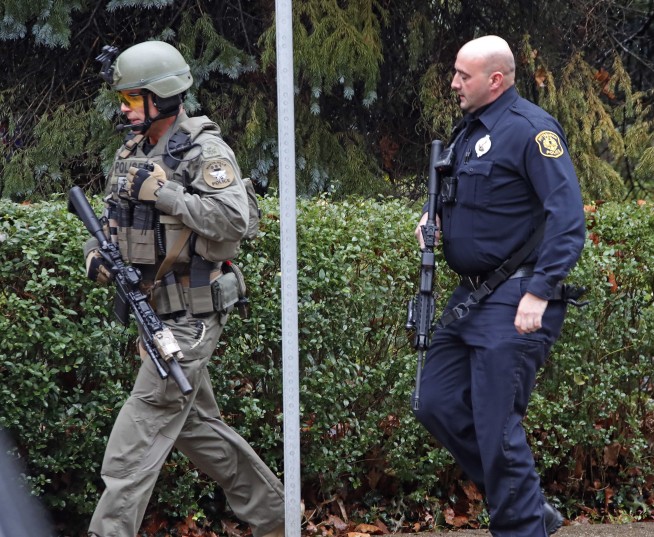 The Latest: Feds to file hate-crime charges in shooting