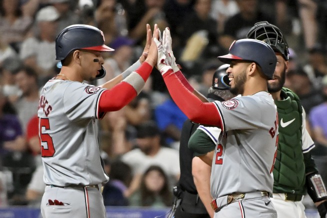 Ryan McMahon draws bases-loaded walk on pitch-clock violation, Rockies beat Nationals 8-7