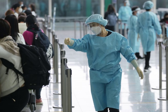 Hong Kong population shrinks for 2nd year under virus curbs