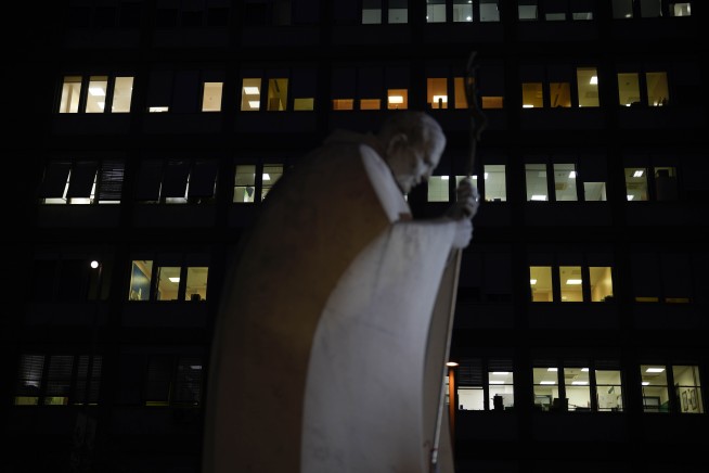 Pope will remain hospitalized as doctors treat a complex respiratory tract infection, Vatican says