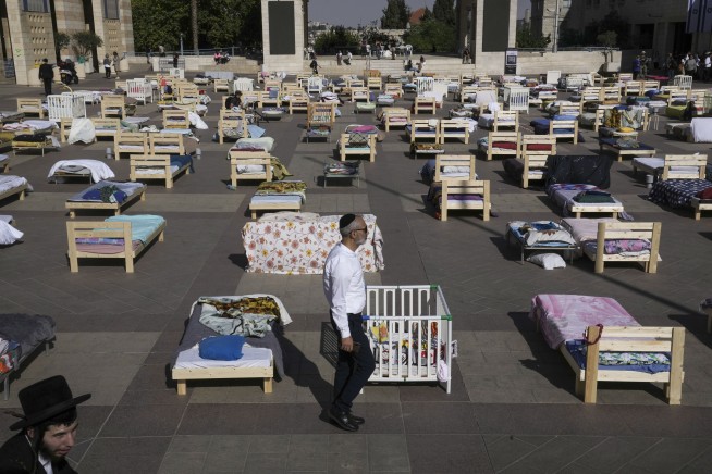 Israel pushes deeper into Gaza and frees Hamas captive; Netanyahu rejects calls for cease-fire