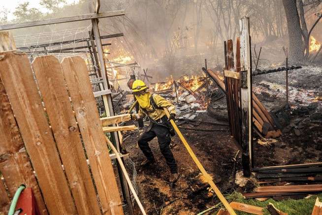 California's largest wildfire explodes in size as fires rage across US West