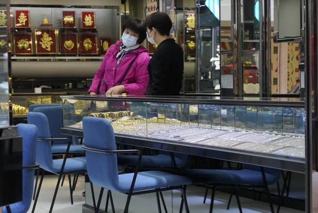 More businesses reopen in China, but many people stay home