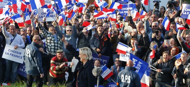 Hacking arrest, fake news in tense French presidential race