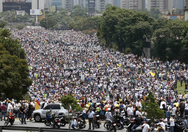2 killed amid massive anti-government marches in Venezuela