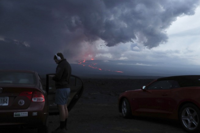 Viewers flock to watch glowing lava ooze from Hawaii volcano