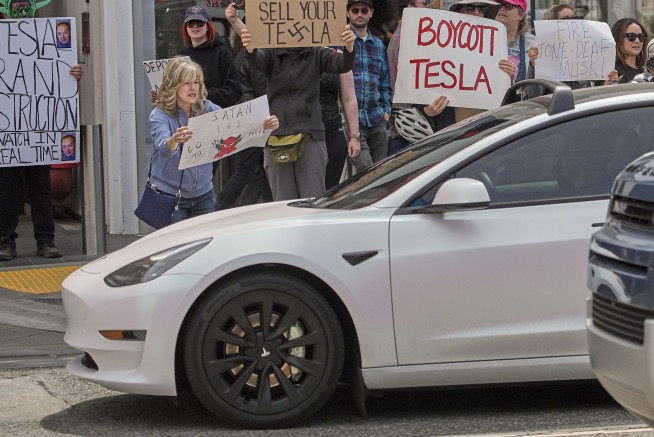 Musk says he'll spend less time in Washington and more time running Tesla after its profit plunges