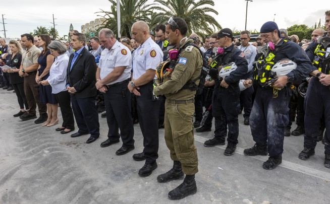 Tears, prayers mark end to search for Miami condo survivors