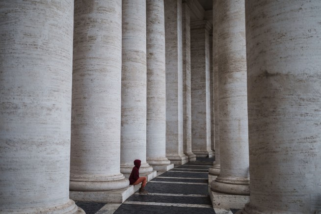 Pope Francis shows slight improvement and resumes some work, while still critical, Vatican says