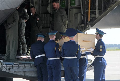 Bodies of Malaysia jet victims leave Ukraine