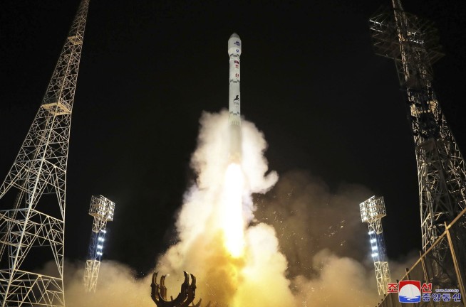 North Korea says it put a military spy satellite into orbit on third try